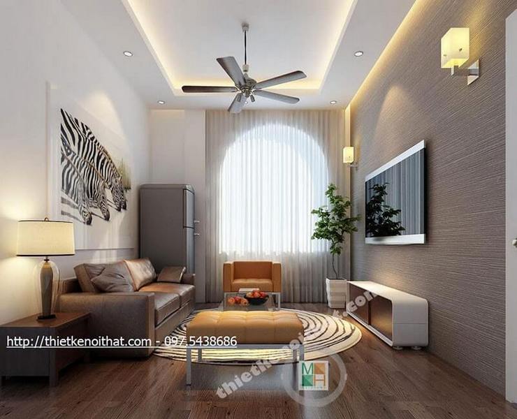 Sửa dụng tranh treo tường và giấy dán tường màu xám cho phòng khách giúp bức tường không còn bị thô cứng mà lại tạo được điểm nhấn cho căn phòng Tranh treo tường phòng khách đẹp, ấn tượng