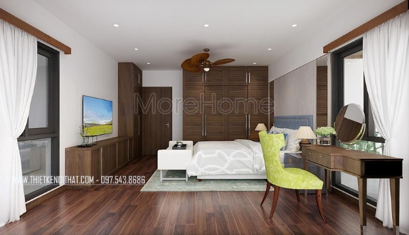 Sàn gỗ, bộ bàn ghế trang điểm, tủ quần áo, kệ tivi, cửa gỗ gỗ óc chó đã tạo nên vẻ đẹp sang trọng, độc đáo trong phong cách hiện đại tại phòng ngủ master mặc dù với phong cách này đồ nội thất gỗ công nghiệp thường là lựa chọn phổ biến. Thiết kế nội thất bệt thự Hà Nội