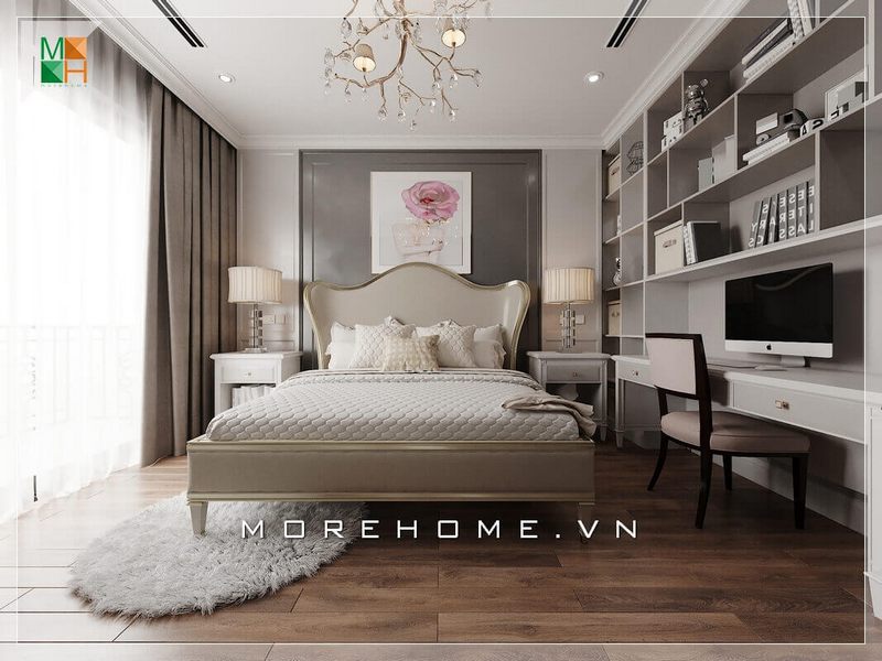 Ấn tượng với mẫu bàn làm việc phòng ngủ chung cư kết hợp kệ sách treo tường đẹp mắt, thiết kế phù hợp với không gian phòng ngủ. Điểm nhấn của căn phòng ngủ tân cổ điển ngoài chiếc giường ra thì cây đèn chùm treo trần và 2 đèn ngủ được đặt 2 bên đầu giường cũng hết sức tinh tế và sang trọng.