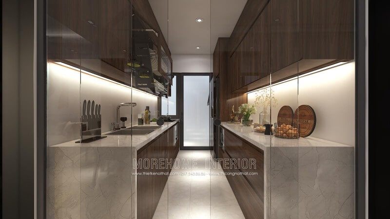 .Gia chủ đã chọn thiết kế tủ bếp đẹp riêng biệt với khu vực sinh hoạt khác, và sử dụng cửa kính cường lực để giữ lại mùi dầu mỡ trong tủ bếp, để tránh ảnh hưởng đến các không gian khác.